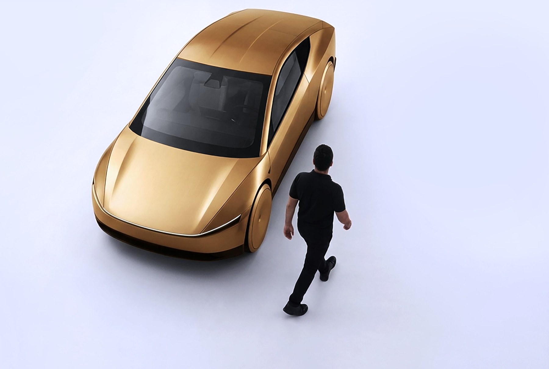 Tesla Cybercab in Savvy gold, shown with a person for scale